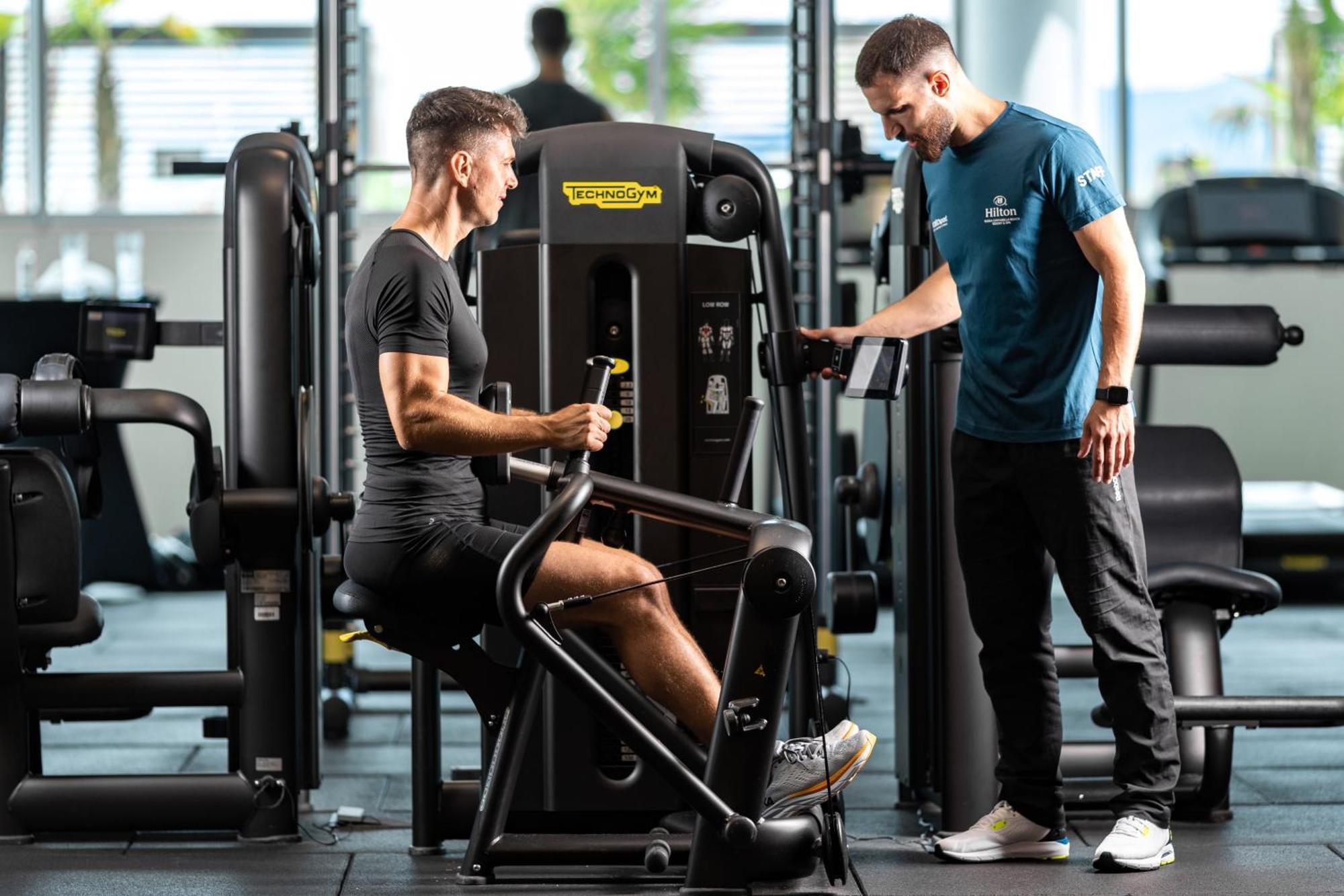 Hilton Rijeka Costabella Beach Resort And Spa Eksteriør billede Personal trainer with a client