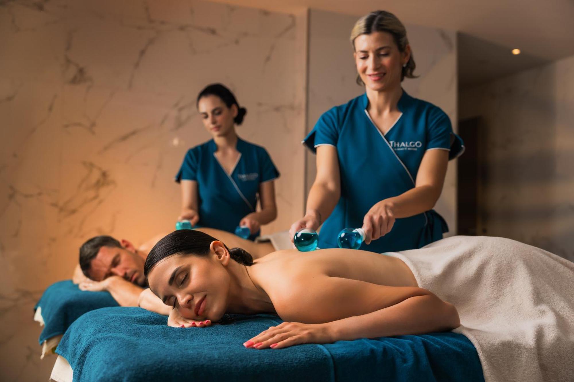 Hilton Rijeka Costabella Beach Resort And Spa Eksteriør billede A massage therapist performing a massage